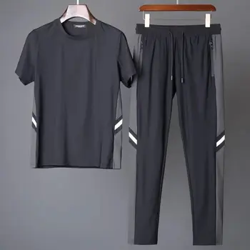Moda masculina de Dois Conjuntos de peças de Verão de Fitness, de secagem Rápida e de Mangas Curtas com O Decote em T-shirts e Calças de Treino de Homens Sólidos Sportswear
